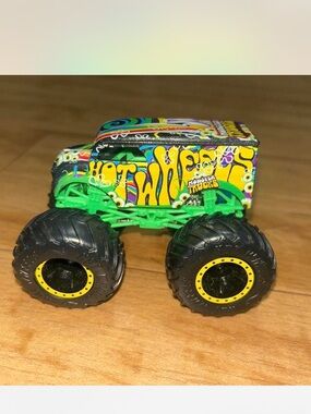 Green Monster Truck Toy with Yellow Wheel Rims